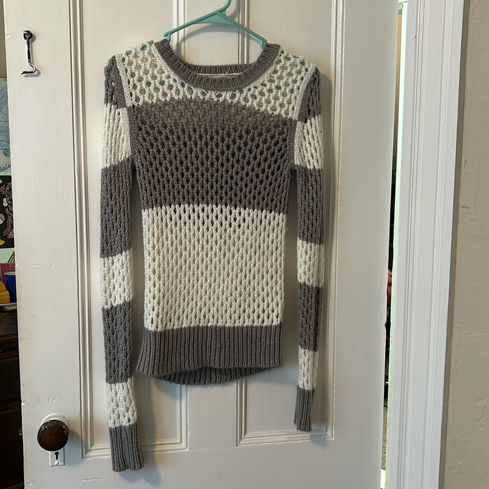 Gray and white knit striped sweater